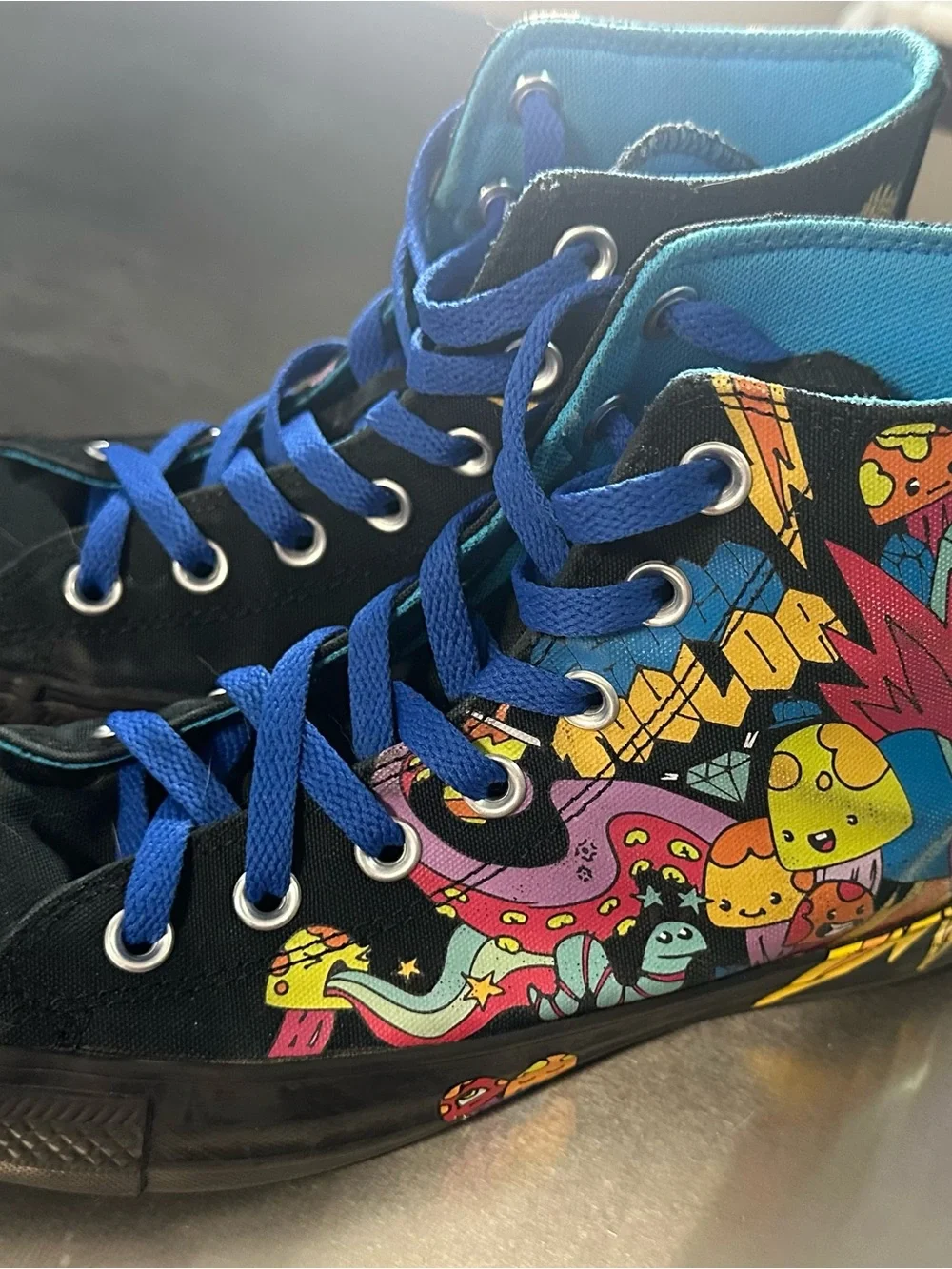Converse Black High-Top Sneakers with Blue Laces and Multicolor Graphic